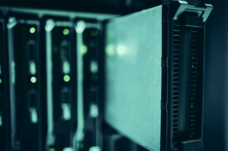 Server room with modern data center infrastructure representing the physical assets that automated check-in workflows manage