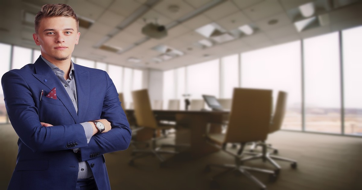 Professional business meeting in a modern office, representing the interview process for a career at a multinational development bank