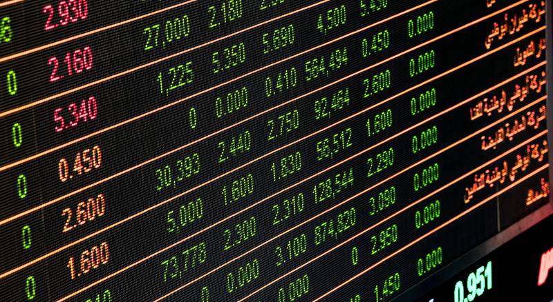 Stock market trading screen displaying numbers and price data, representing the real-time flow of A-share market activity driven by retail investors