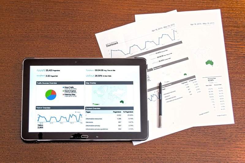 Business analytics charts and data visualization on a screen, representing the data-driven approach that engineers bring to investing