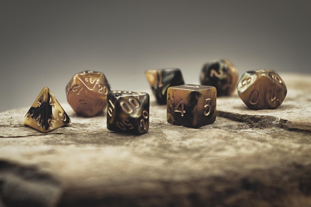 A set of polyhedral D&D dice resting on a character sheet, representing the player agency and chance that drive RPG storytelling